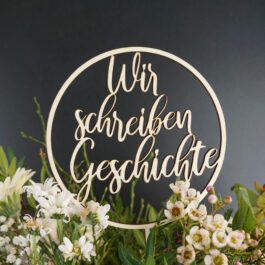 Caketopper "Wir schreiben Geschichte" mit Blumendeko